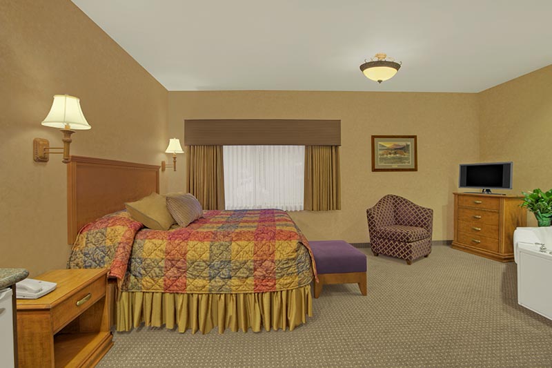 King Whirlpool Luxury Suite bedroom
