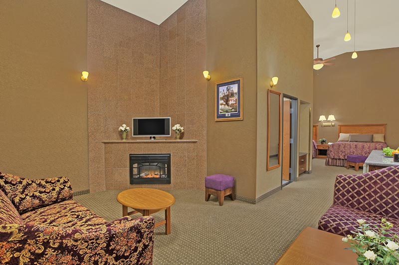Queen Whirlpool Luxury Suite fireplace