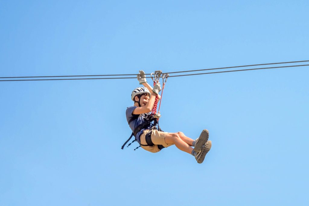 Someone zip lining at Rush Mountain Adventure Park.