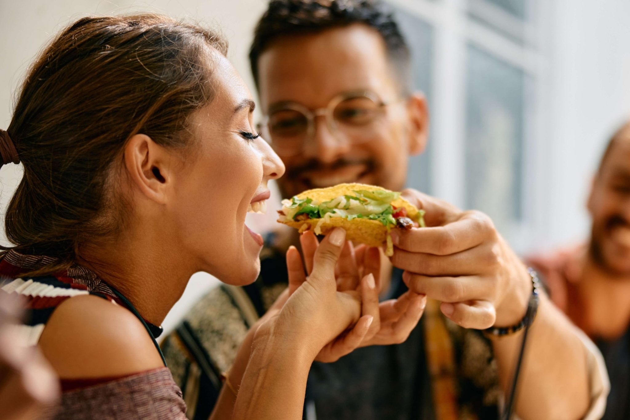 A woman and a man enjoying Rapid City Restaurants.