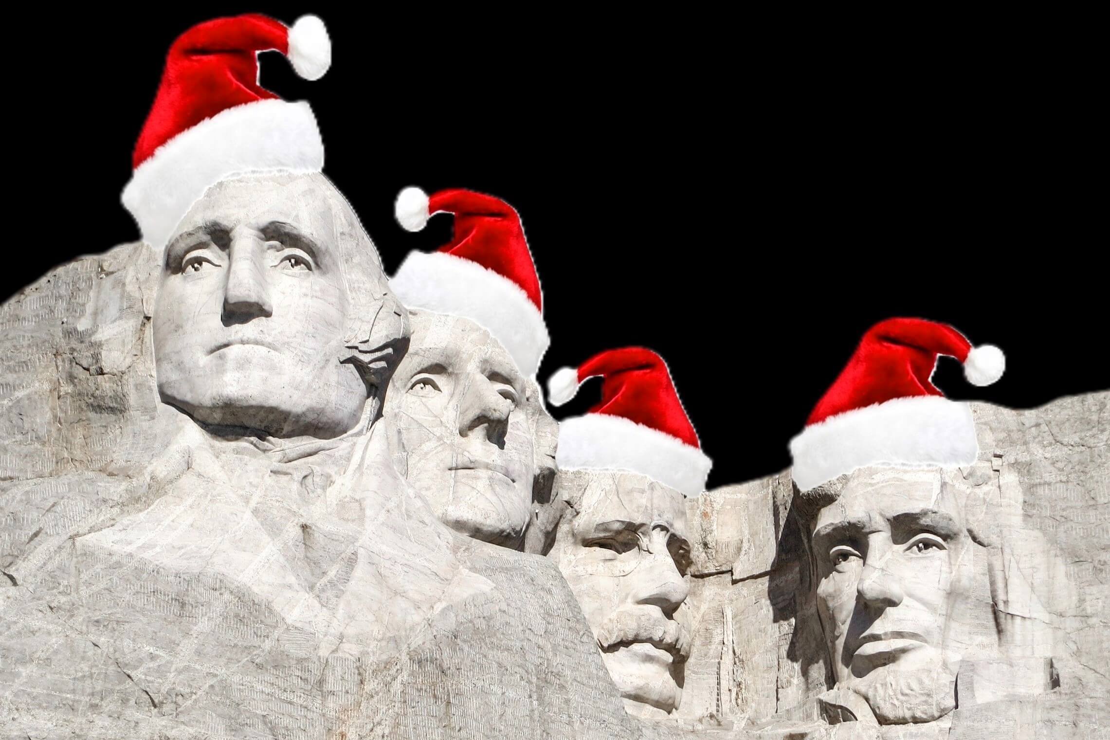 Mount Rushmore with Santa hats on a Christmas Vacation Family.