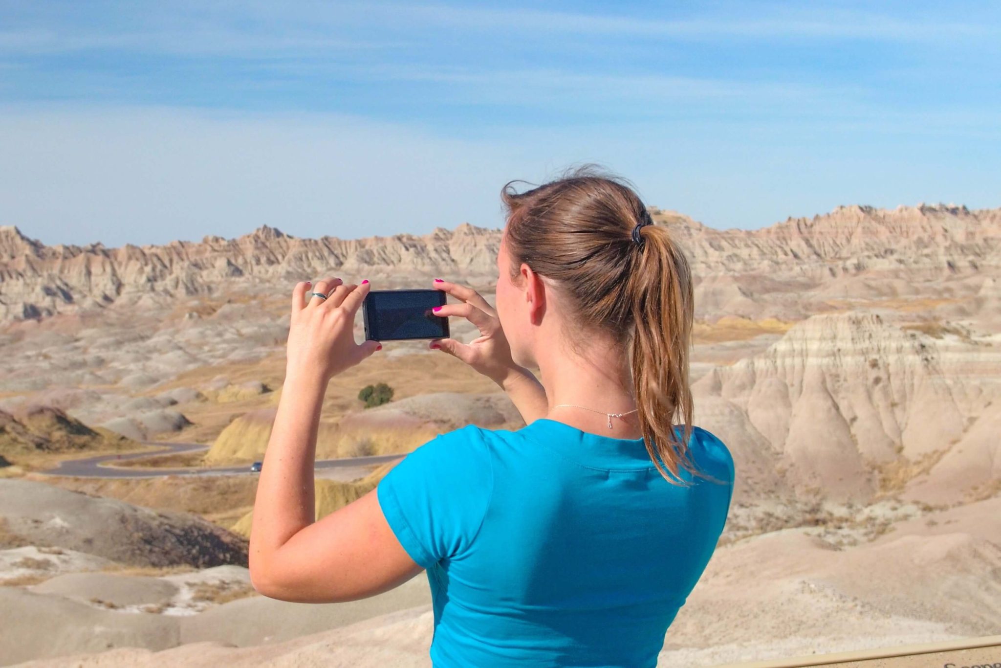 A woman using Travel Apps in South Dakota.